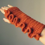 Frilly Fingerless Gloves in Orange by Elde