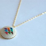 Golden Triangle Cross Stitched Pendant Necklace by Gamma Folk